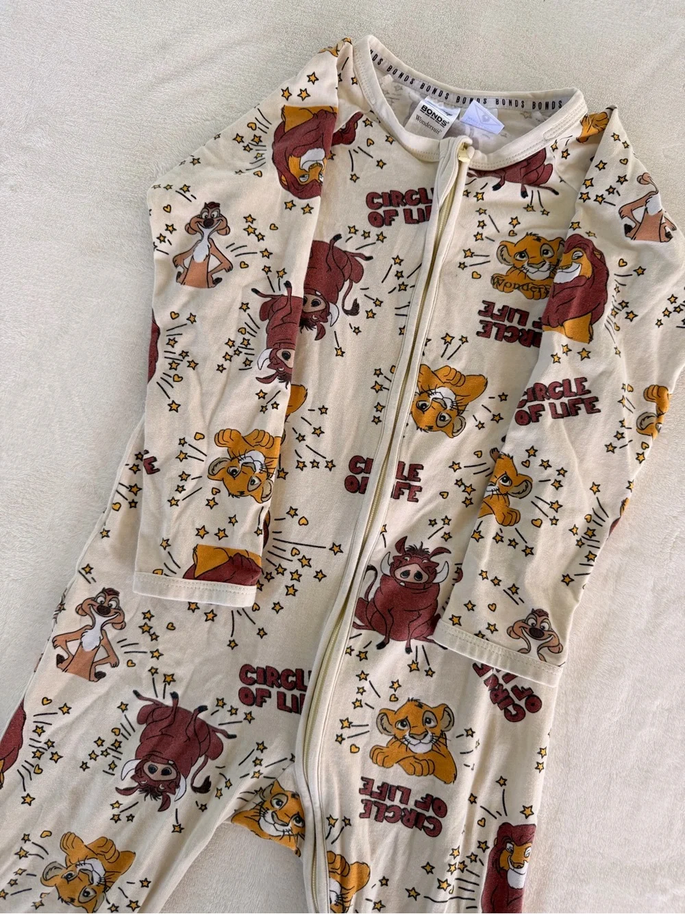 Bonds Disney's The Lion King Circle of Life Wondersuits in a beige color